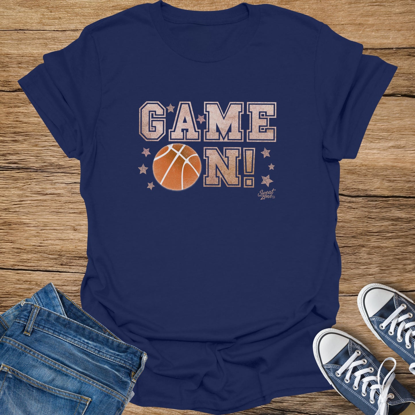 Navy t-shirt with "GAME ON!" text and basketball graphic.