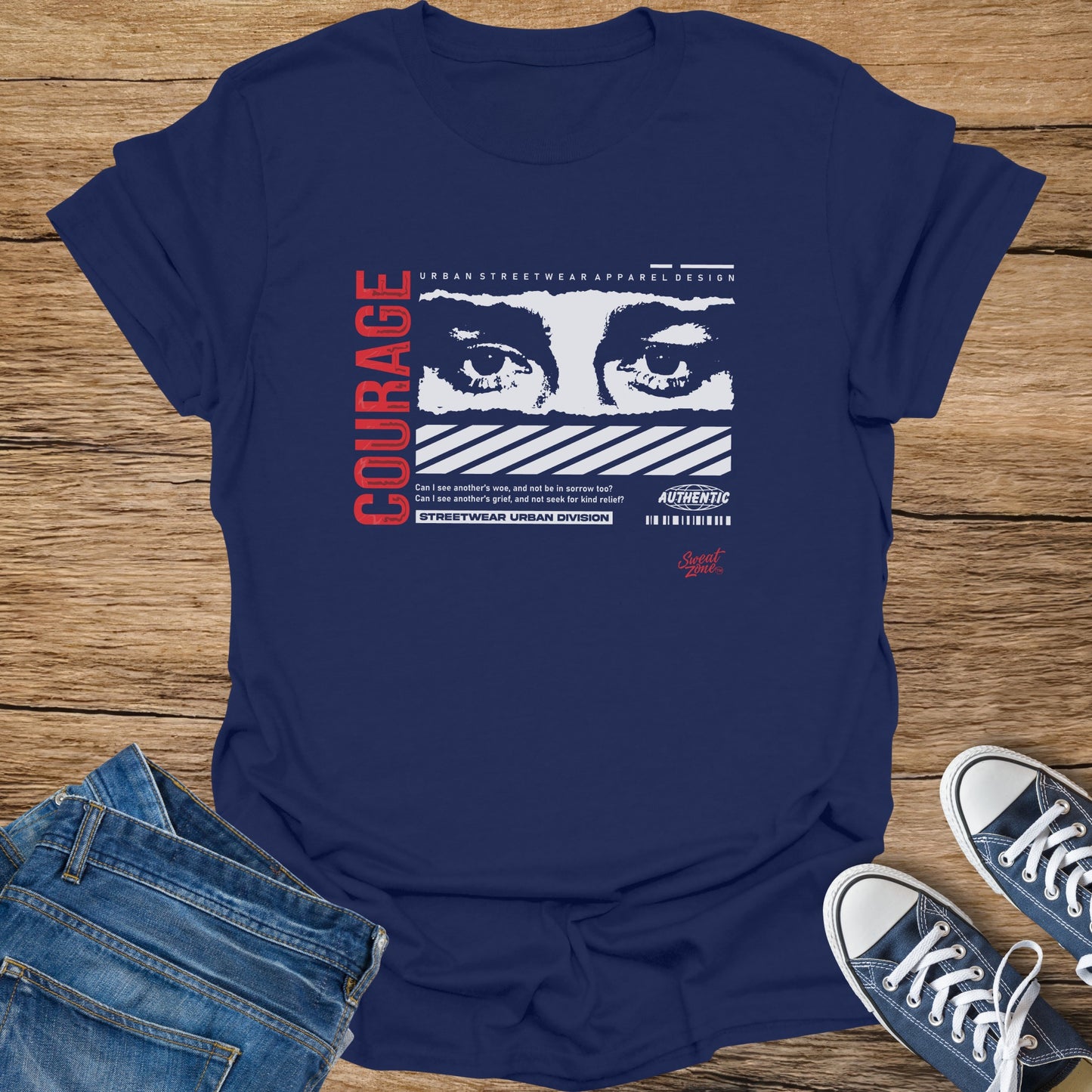 Navy t-shirt with "COURAGE" text, graphic of eyes, and streetwear design.
