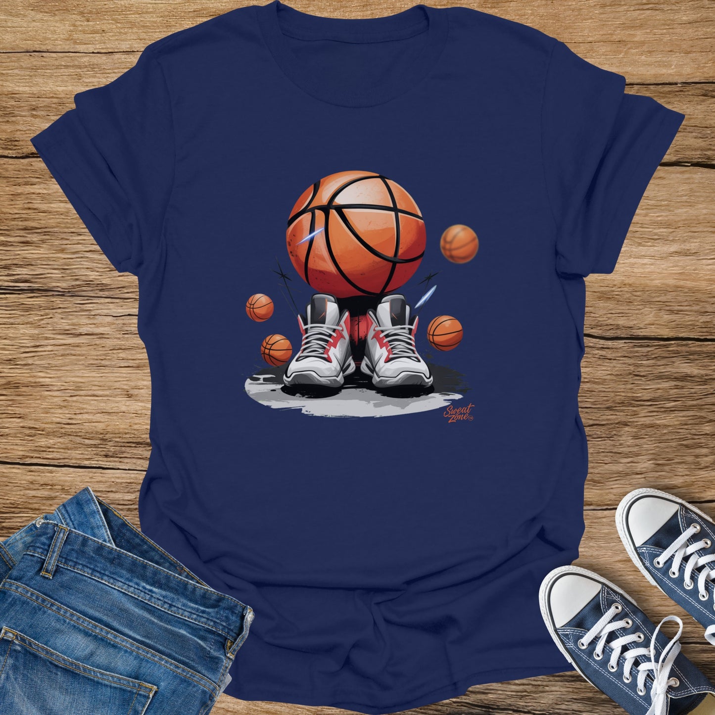 Basketball graphic t-shirt with sneakers on wooden background
