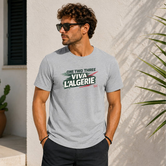 Man wearing a grey t-shirt with "ONE TWO THREE VIVA L'ALGERIE" text.