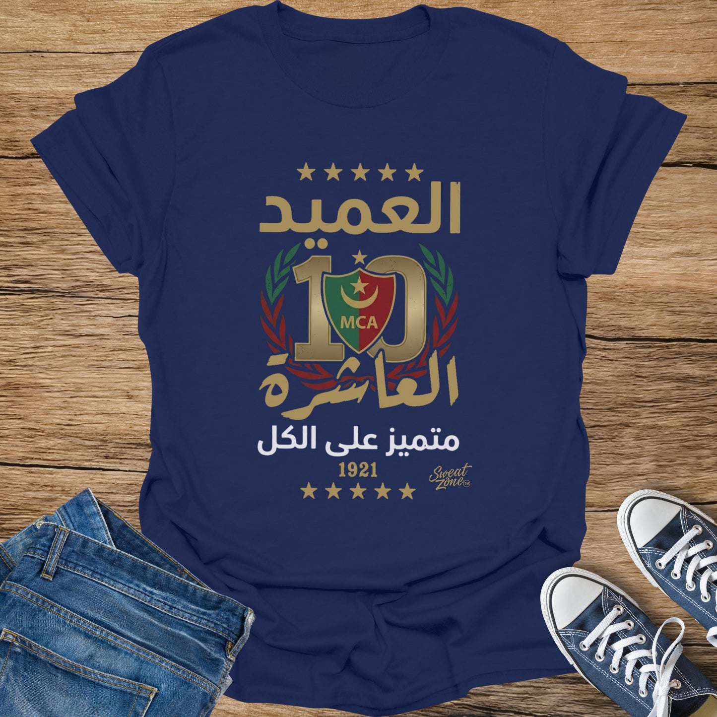 Navy t-shirt with Arabic text, "10 MCA", laurel wreath, and "1921".
