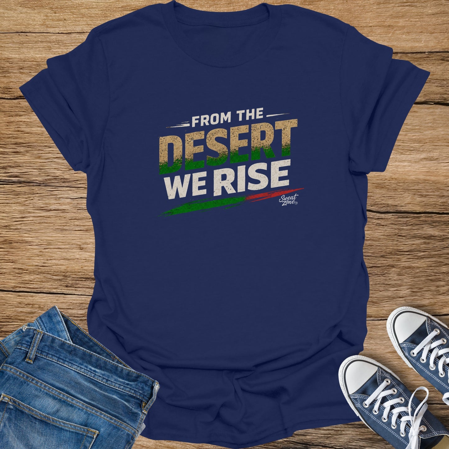 Navy t-shirt with "From the Desert We Rise" text and a small logo.