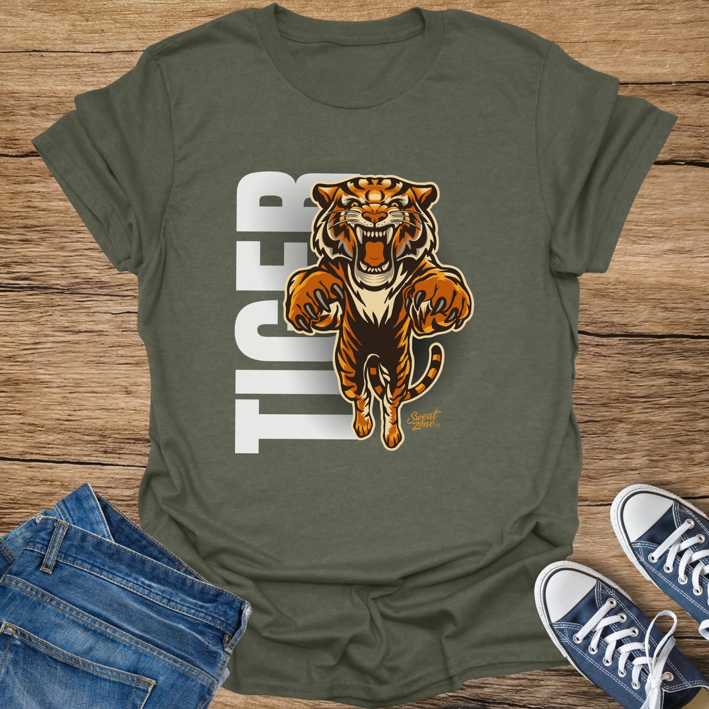 Green t-shirt with a roaring tiger graphic and the word "TIGER".