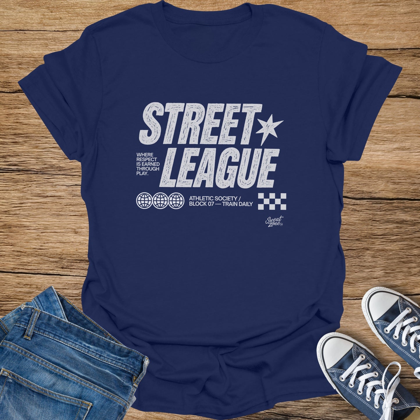 Navy t-shirt with "Street League Where Respect Is Earned Through Play" graphic.