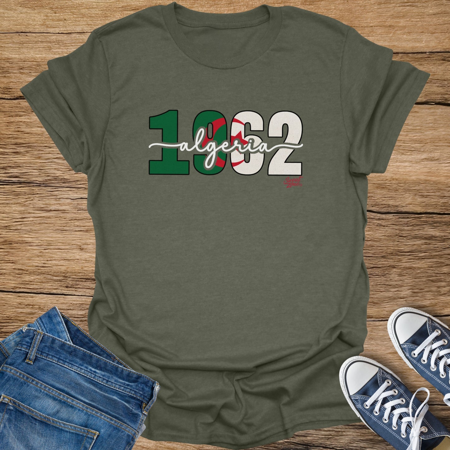 Olive green t-shirt with "1962 Algeria" graphic in red, white, and green.