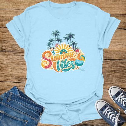 Light blue t-shirt with "Summer Vibes" graphic featuring palm trees and a sun.