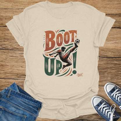Soccer player kicking ball with text "BOOT UP!" and "Sweat Zone" logo.