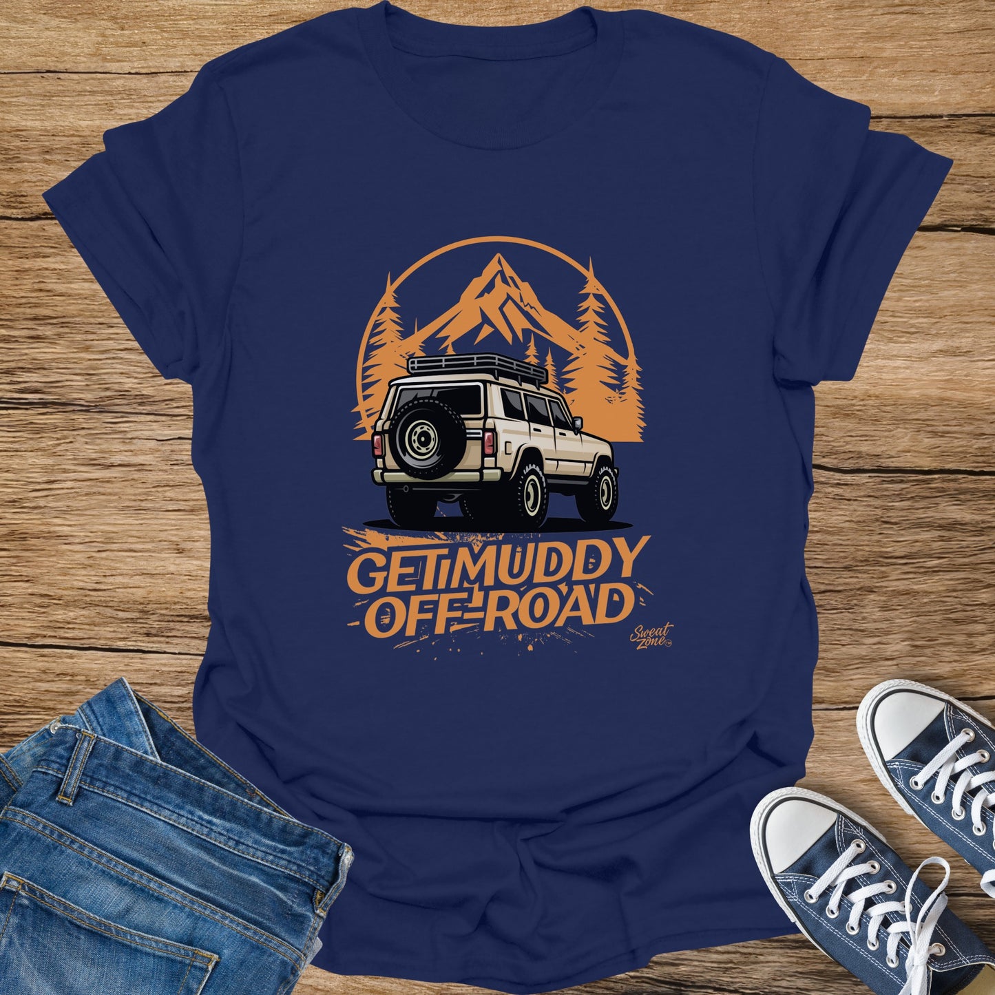 Navy t-shirt with off-road vehicle, mountains, and text "Get Muddy Off-Road".