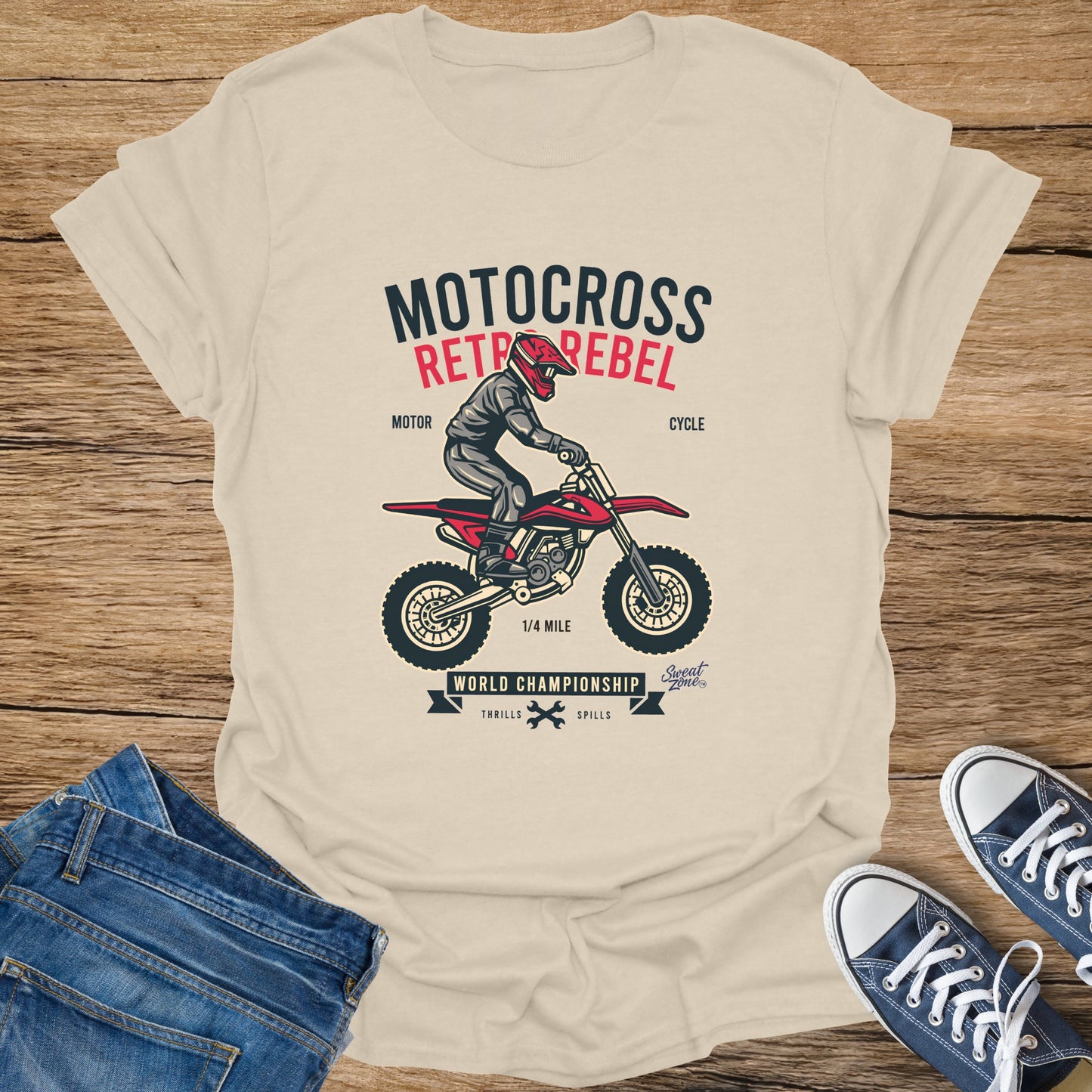 Motocross Rebel graphic on a light beige t-shirt with "World Championship" and "1/4 Mile" text.