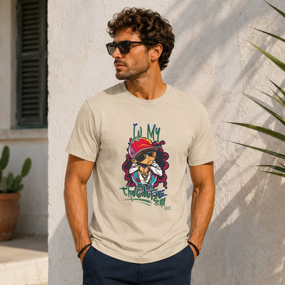 Man wearing a tan t-shirt with cartoon "Thuglife" graphic.