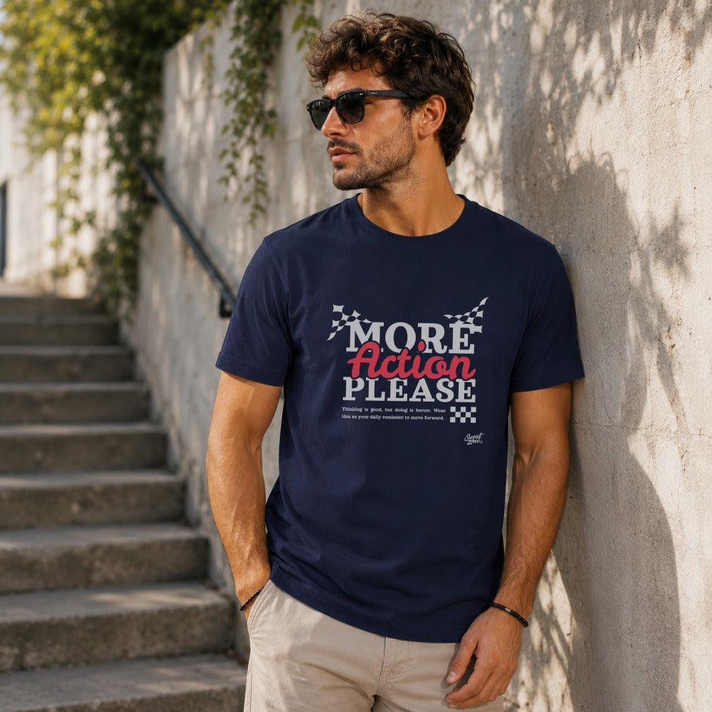 Navy t-shirt with "MORE ACTION PLEASE" in pink and white, featuring checkered flags.