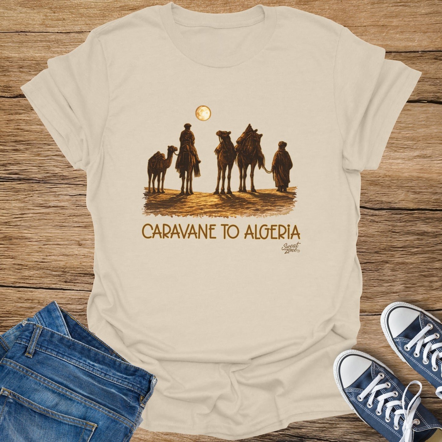 Caravane to Algeria text with camel caravan and moon illustration on t-shirt.