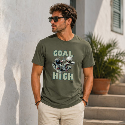 Olive green t-shirt with "GOAL HIGH" text and astronaut playing soccer with the moon.
