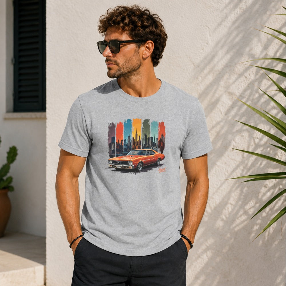 Grey t-shirt with graphic of an orange vintage car and colorful New York City skyline.