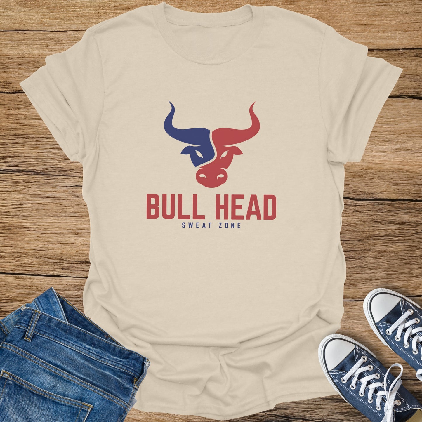 Cream t-shirt with red and blue bull head logo and text "BULL HEAD SWEAT ZONE".
