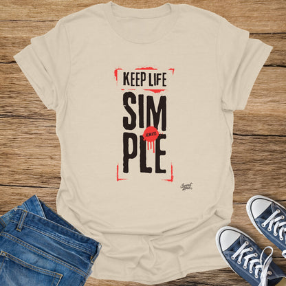 Mens cream t-shirt with "KEEP LIFE SIMPLE ALWAYS" text graphic.