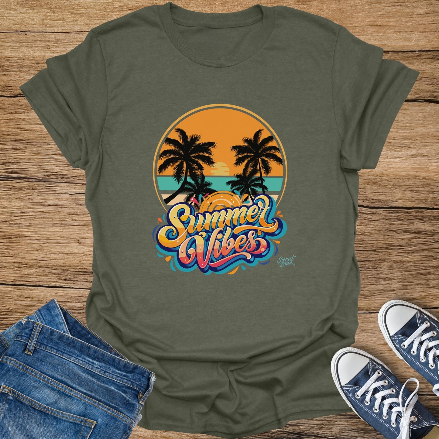 Olive green t-shirt with "Summer Vibes" text and tropical sunset graphic.