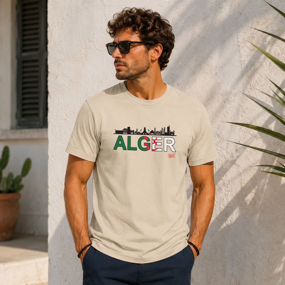 Beige t-shirt with "ALGER" text and Algerian flag, featuring a city skyline.