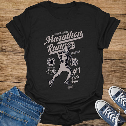 Black t-shirt with "Marathon Runner" graphic, runner, 5K, 10K, and 2026.