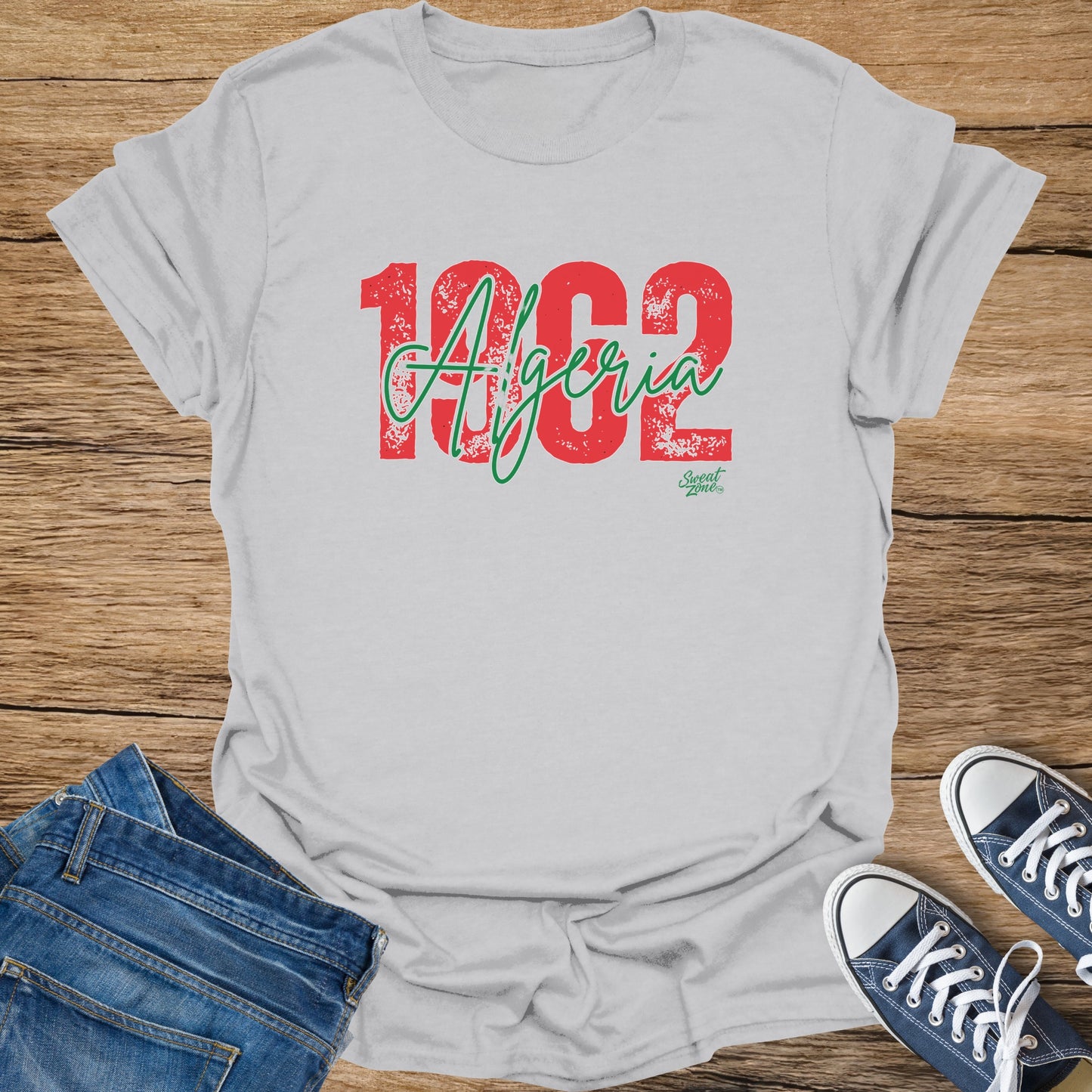 Grey t-shirt with "1962 Algeria" printed in distressed red and green.