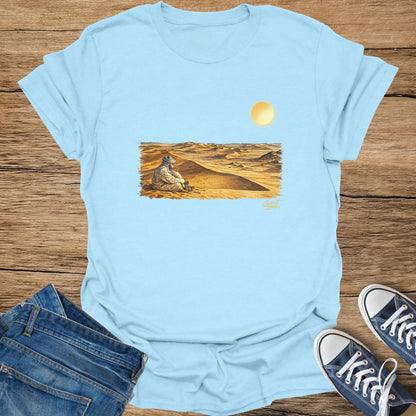 Light blue t-shirt with desert scene art and text "Sweat Zone".
