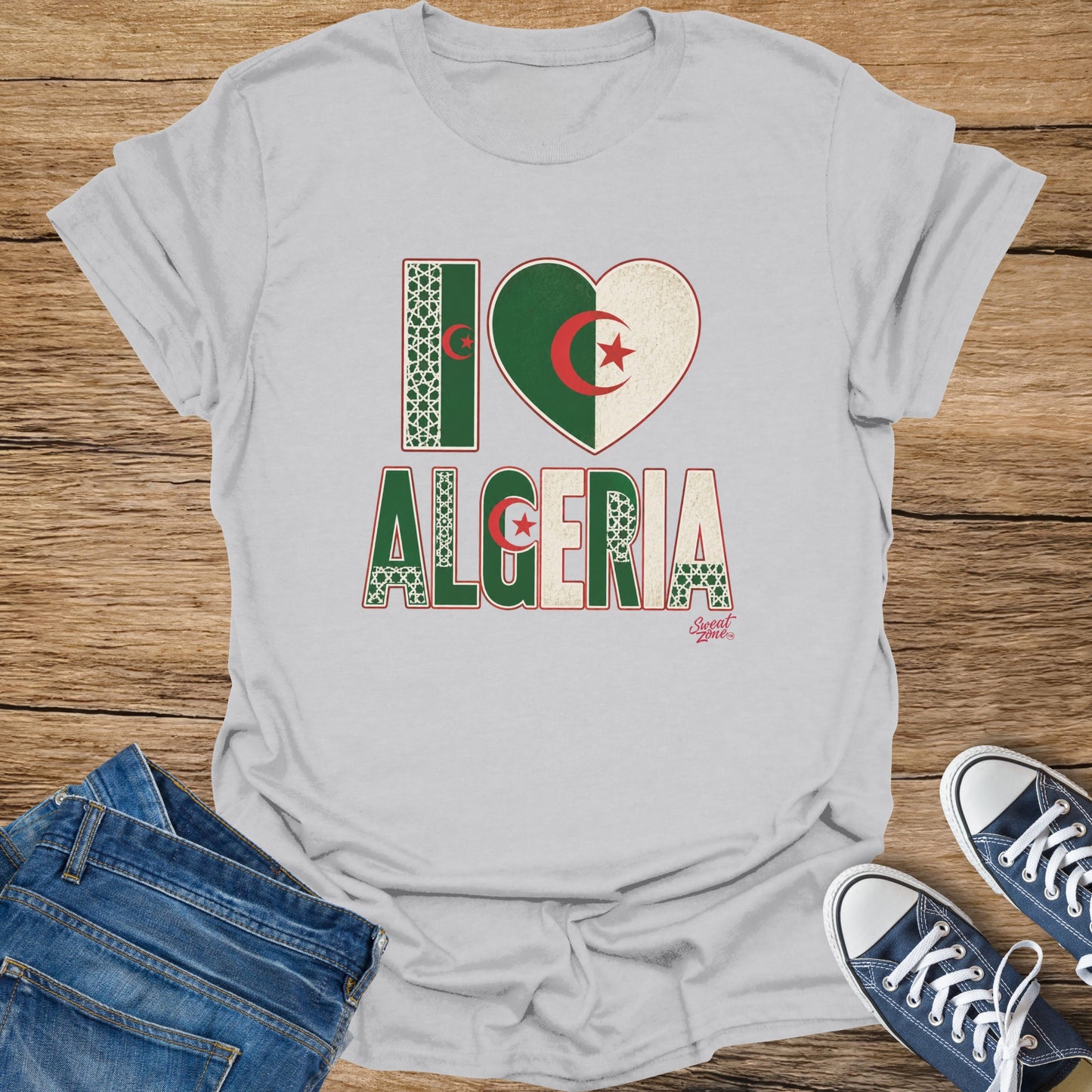 "I" graphic with Algerian flag heart and "ALGERIA" text on a t-shirt.