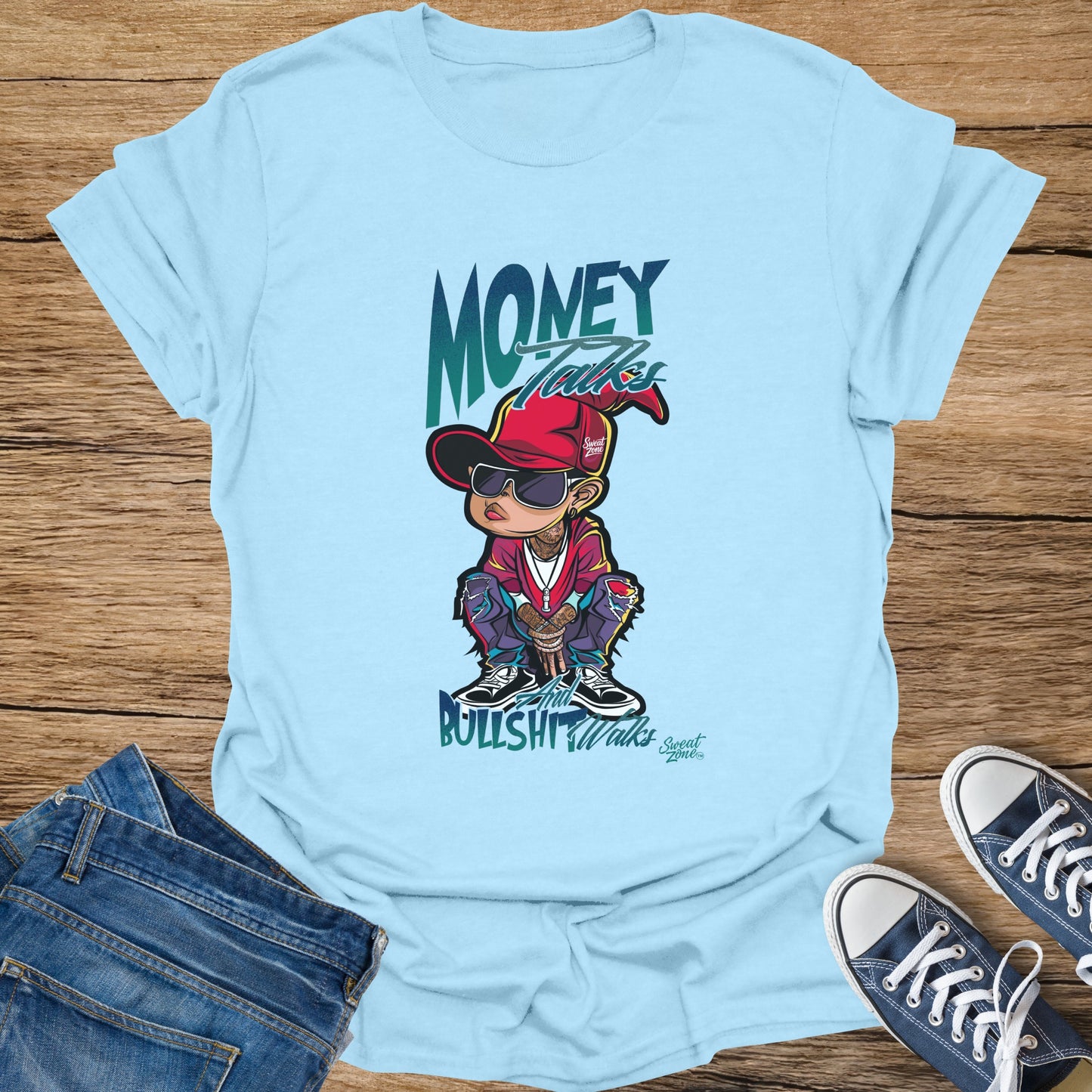 Light blue t-shirt with cartoon character, "Money Talks, Bullshit Walks" text, and "Sweat Zone" logo.