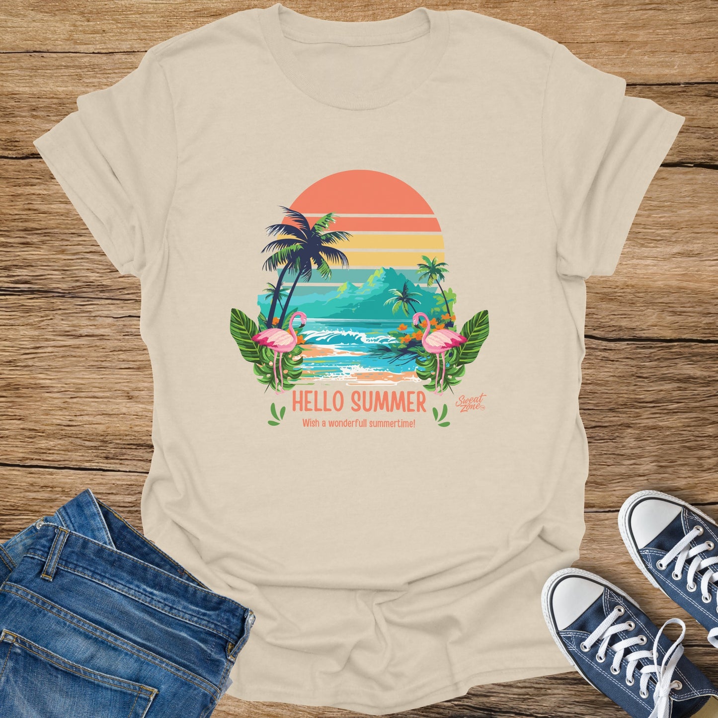 T-shirt with "Hello Summer" graphic featuring flamingos, palm trees, and waves.