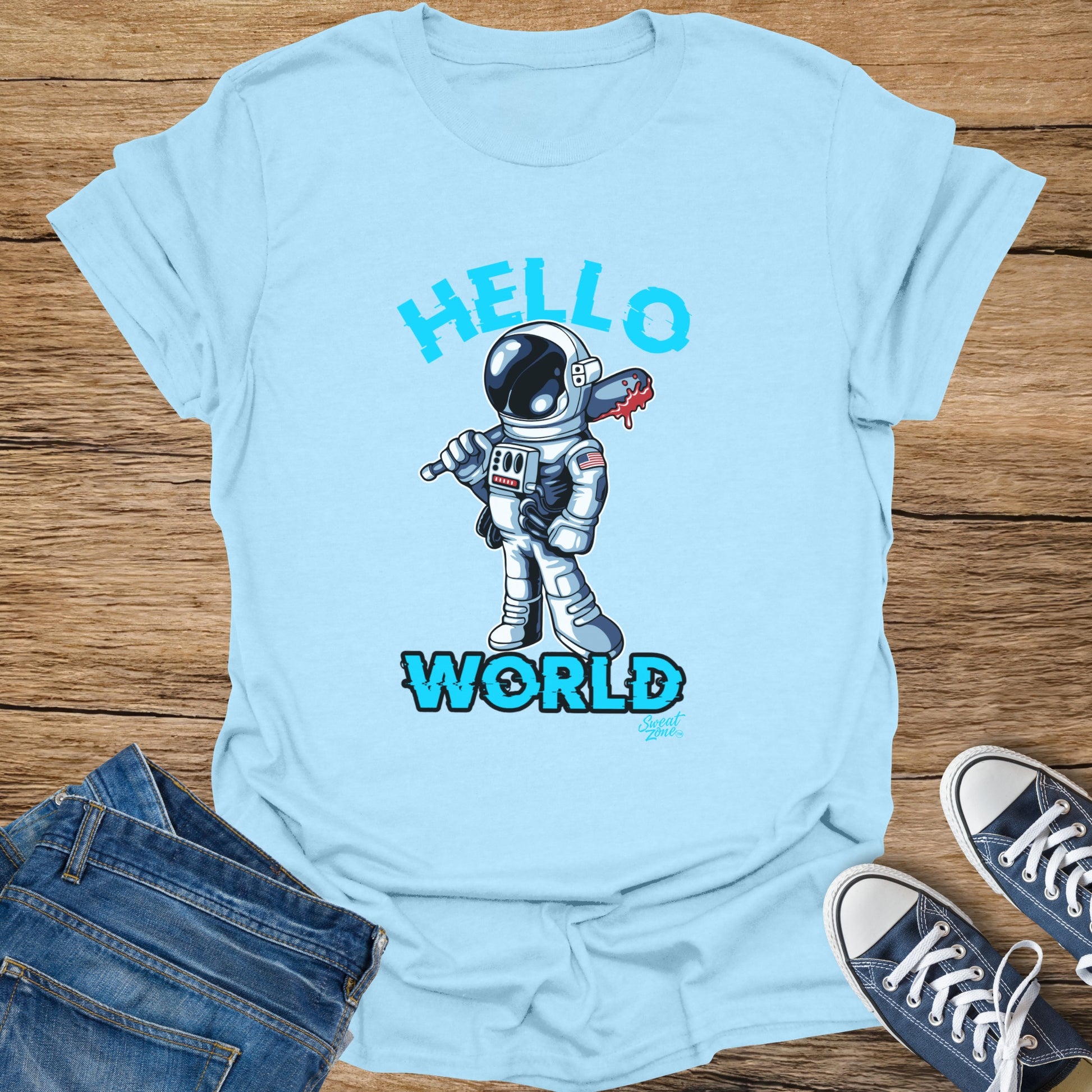 Light blue t-shirt with astronaut graphic and text "HELLO WORLD"