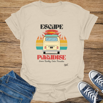 Cream t-shirt with "ESCAPE PARADISE" graphic featuring a van and sunset.
