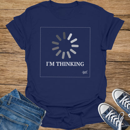 Navy t-shirt with loading circle graphic and "I'M THINKING" text.