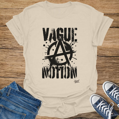 Cream t-shirt with black graphic text "VAGUE MOTION" and anarchy symbol.