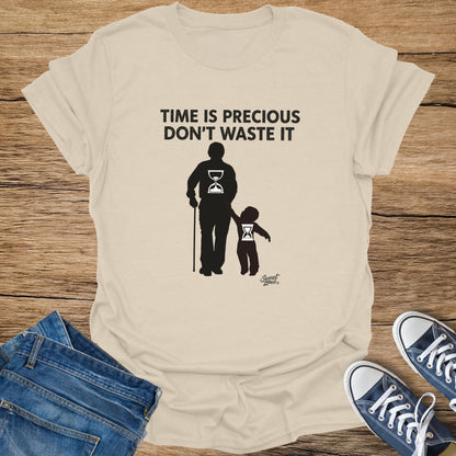 T-shirt with "TIME IS PRECIOUS DON'T WASTE IT" and silhouette of old man holding child.