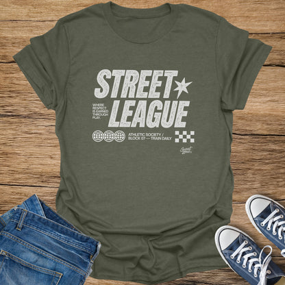 Green t-shirt with "STREET LEAGUE" text, globes, and checkerboard graphic.