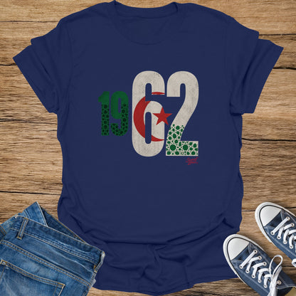 Navy t-shirt with "1962" in distressed font, incorporating Algerian flag and geometric patterns.