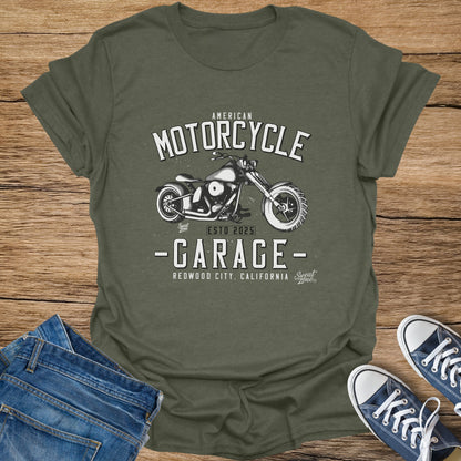 Olive green t-shirt with retro motorcycle graphic and text.