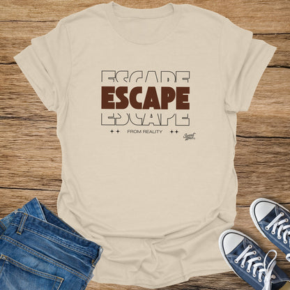 Light tan t-shirt with bold text that reads "ESCAPE FROM REALITY".