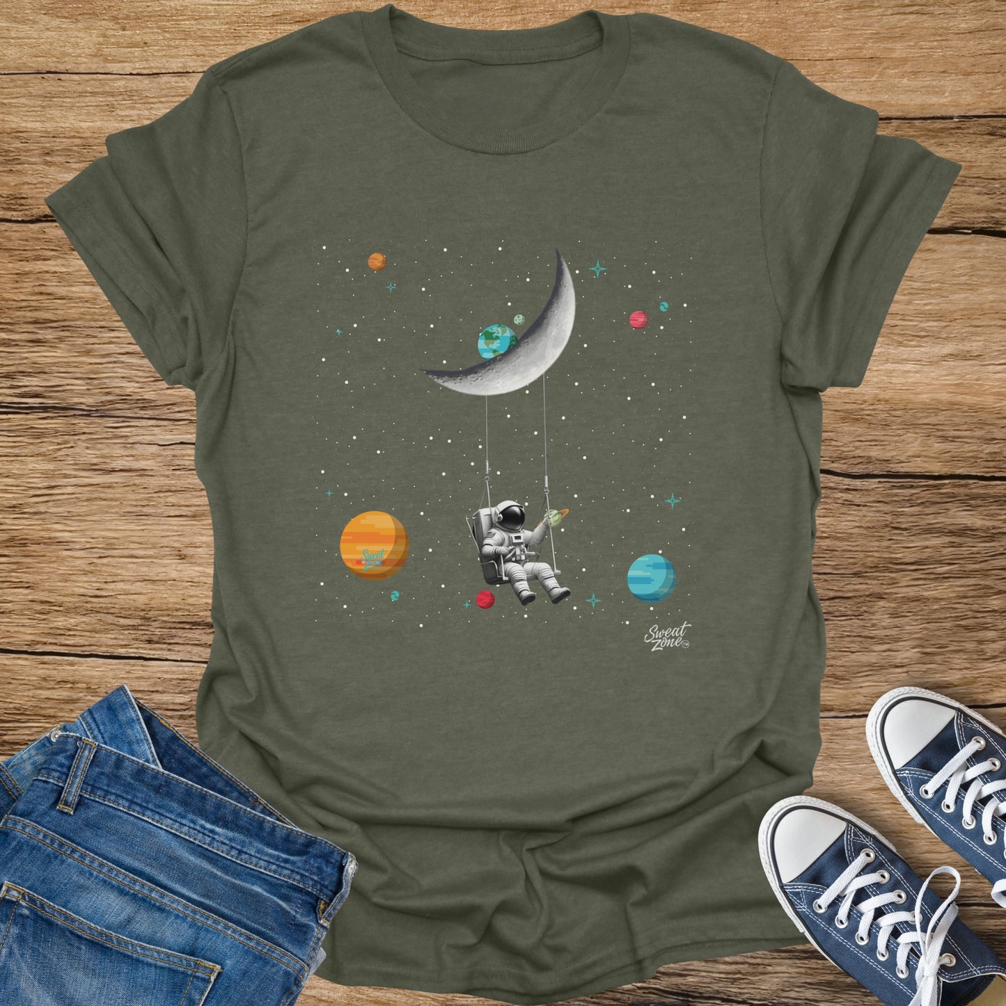 Astronaut on a swing tied to a crescent moon with planets and stars.