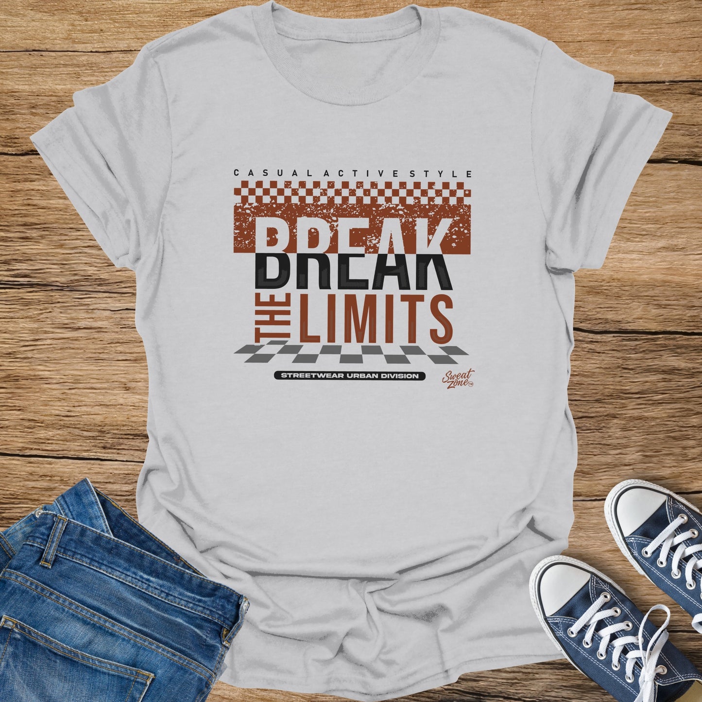 White t-shirt with "BREAK THE LIMITS" in distressed text, alongside "CASUAL ACTIVE STYLE" and "STREETWEAR URBAN DIVISION".