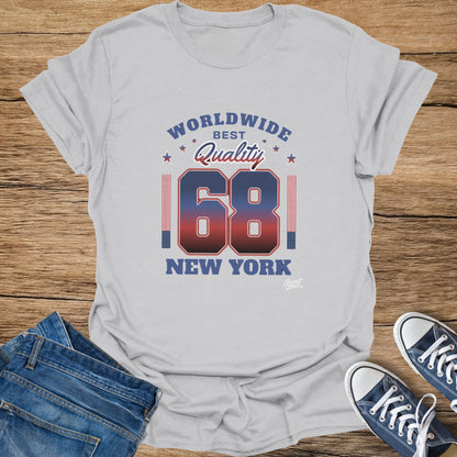 Gray t-shirt with "Worldwide Best Quality 68 New York" text and American flag stripes.