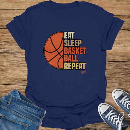 Navy t-shirt with "EAT SLEEP BASKETBALL REPEAT" basketball graphic.