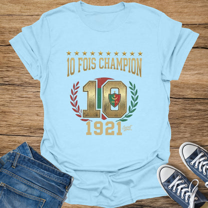 Pale blue t-shirt with "10 FOIS CHAMPION 1921" and MCA logo.