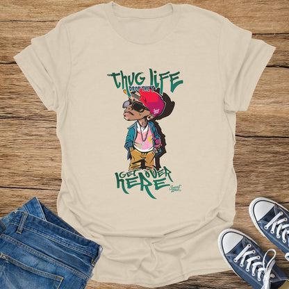 Cream t-shirt with cartoon graphic of character and text "Thug Life Drop the T Get Over Here".