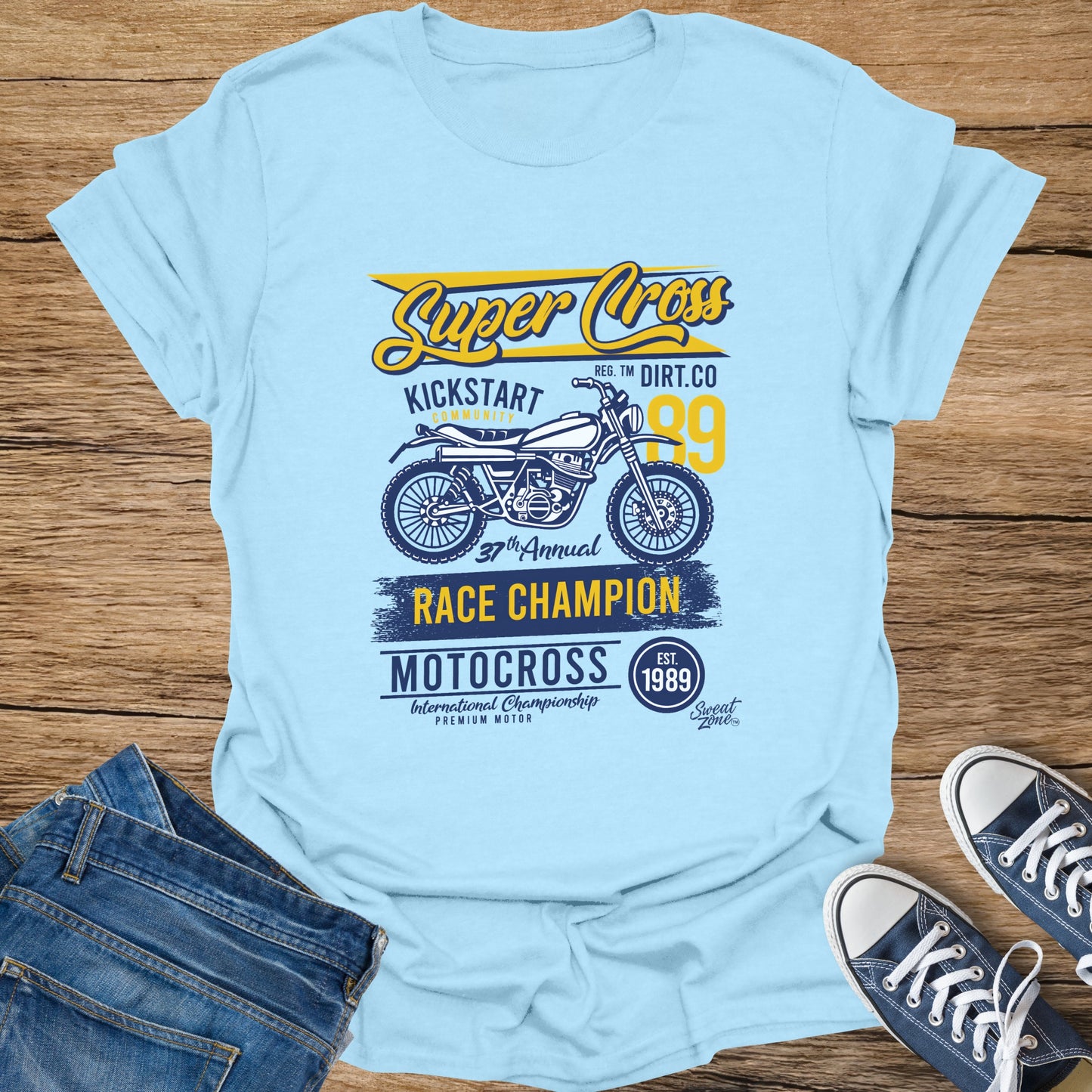 Light blue t-shirt with Super Cross Motocross Race Champion graphic and dirt bike.