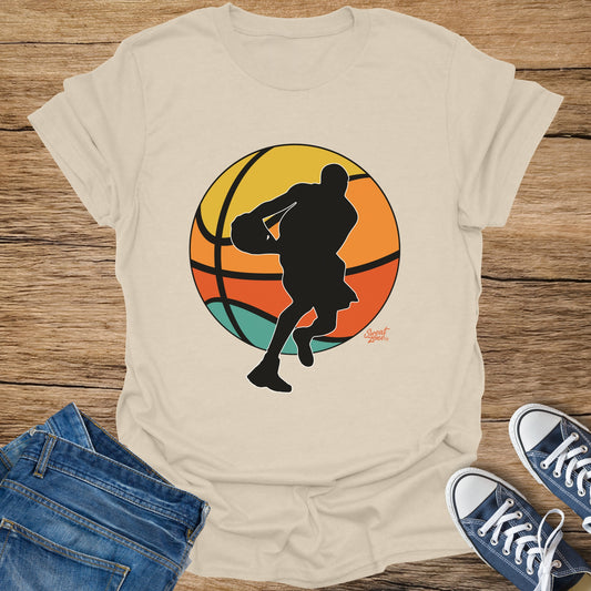 T-shirt with a black basketball player silhouette and vintage-style basketball graphic.