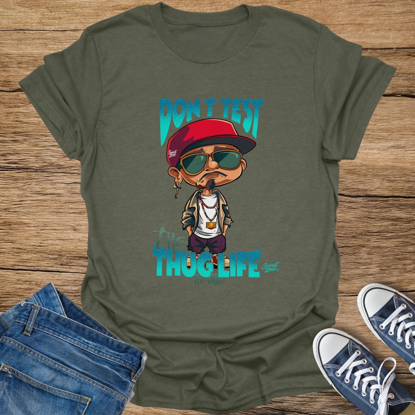 Olive t-shirt with cartoon man graphic reading "DON'T TEST THUG LIFE".