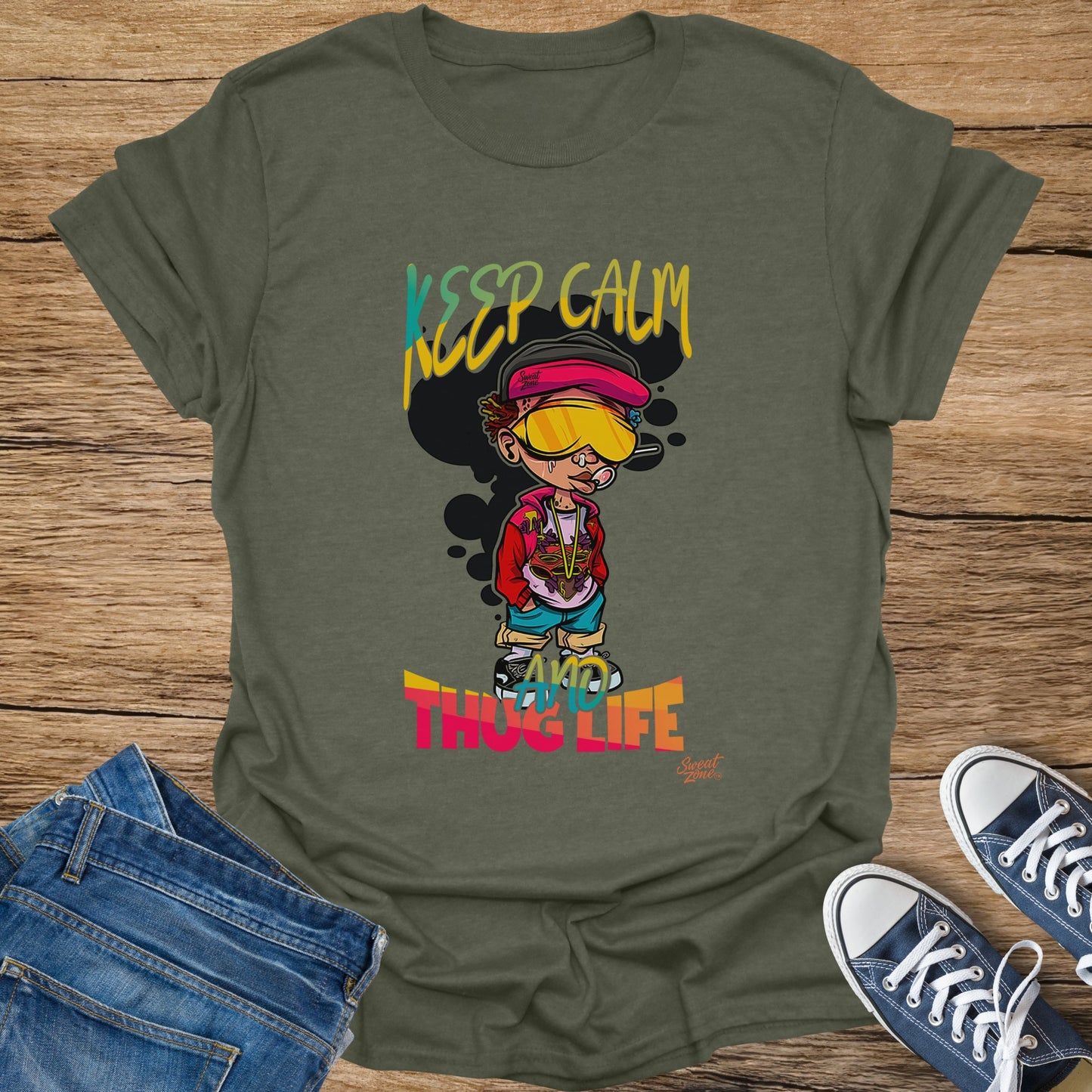Green t-shirt with cartoon character and text "KEEP CALM AND THUG LIFE".