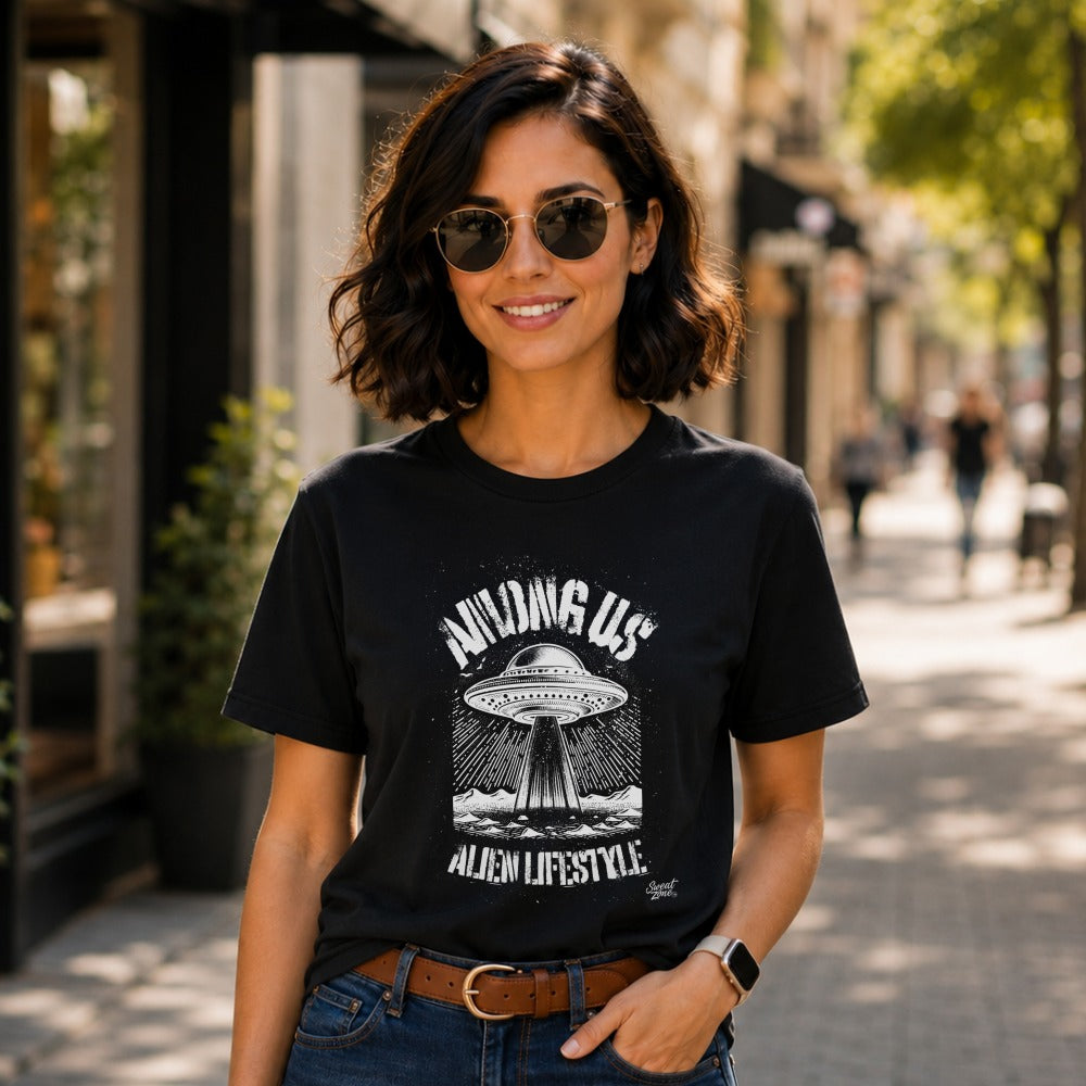 Black t-shirt with "Among Us Alien Lifestyle" text and UFO graphic.