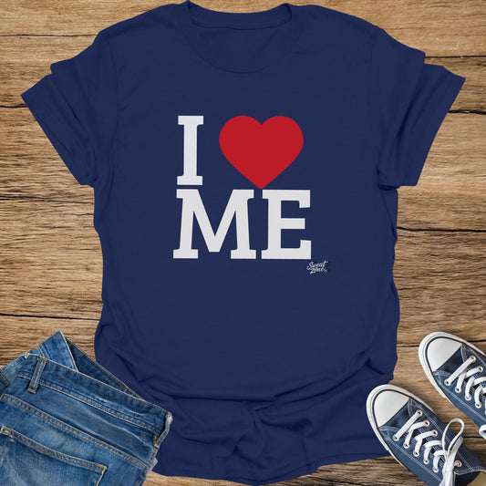 Navy t-shirt with white "I ❤️ ME" graphic and small "Sweat Zone" logo.
