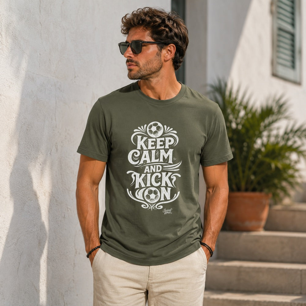 Men's olive green t-shirt with "Keep Calm and Kick On" and soccer ball graphic.